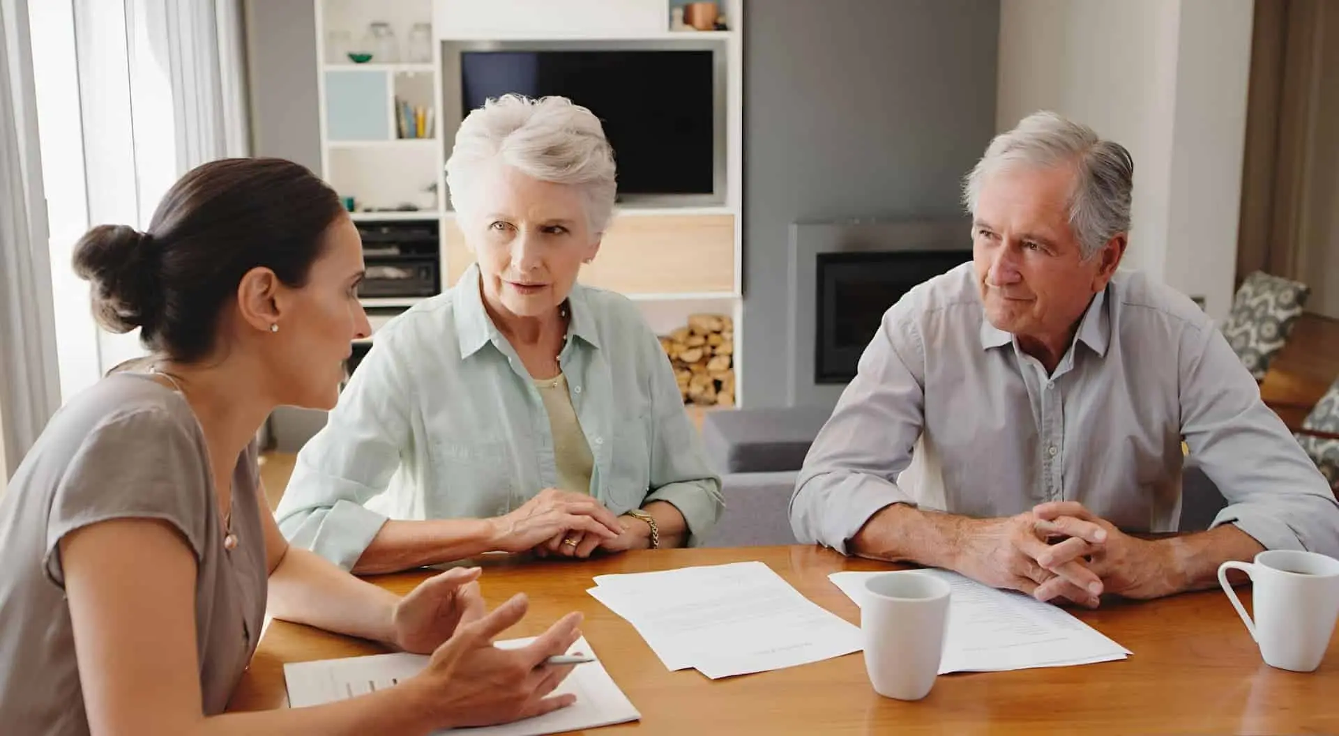 Daughter helps senior parents fill out probate sale paperwork